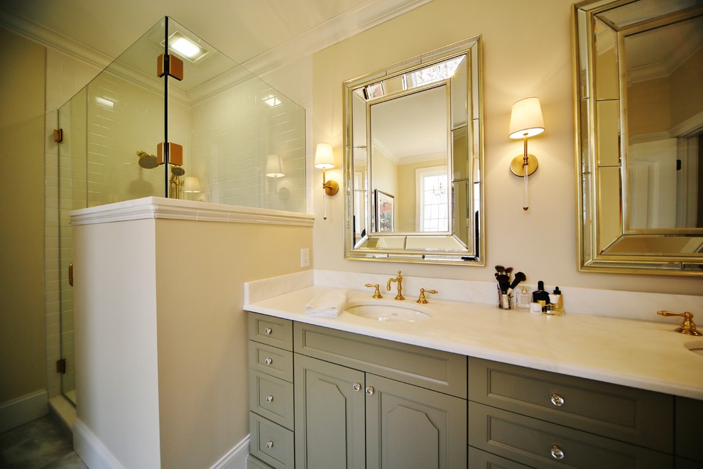 Bathroom - mid-sized eclectic master white tile and ceramic tile marble floor bathroom idea in Other with furniture-like cabinets, green cabinets, a two-piece toilet, beige walls and an undermount sink