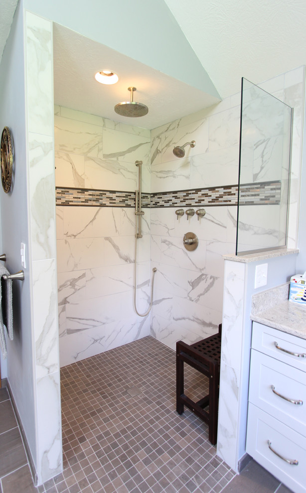 Example of a mid-sized master black and white tile and ceramic tile ceramic tile and beige floor bathroom design in Cleveland with flat-panel cabinets, gray cabinets, a two-piece toilet, blue walls, an undermount sink, quartz countertops and beige countertops