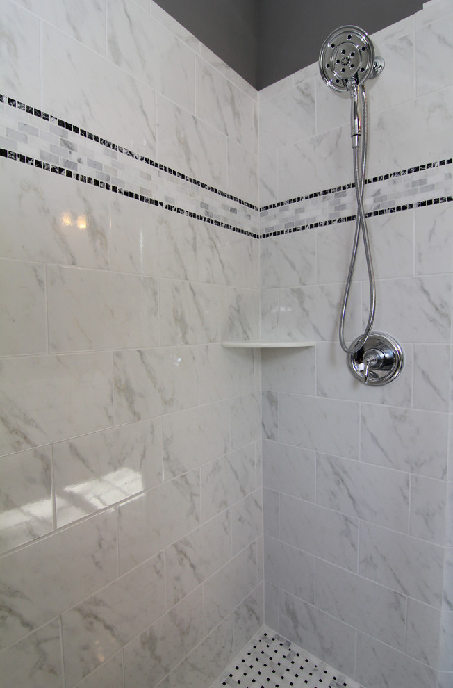 Corner shower - mid-sized contemporary master white tile and ceramic tile ceramic tile corner shower idea in Raleigh with a one-piece toilet and gray walls