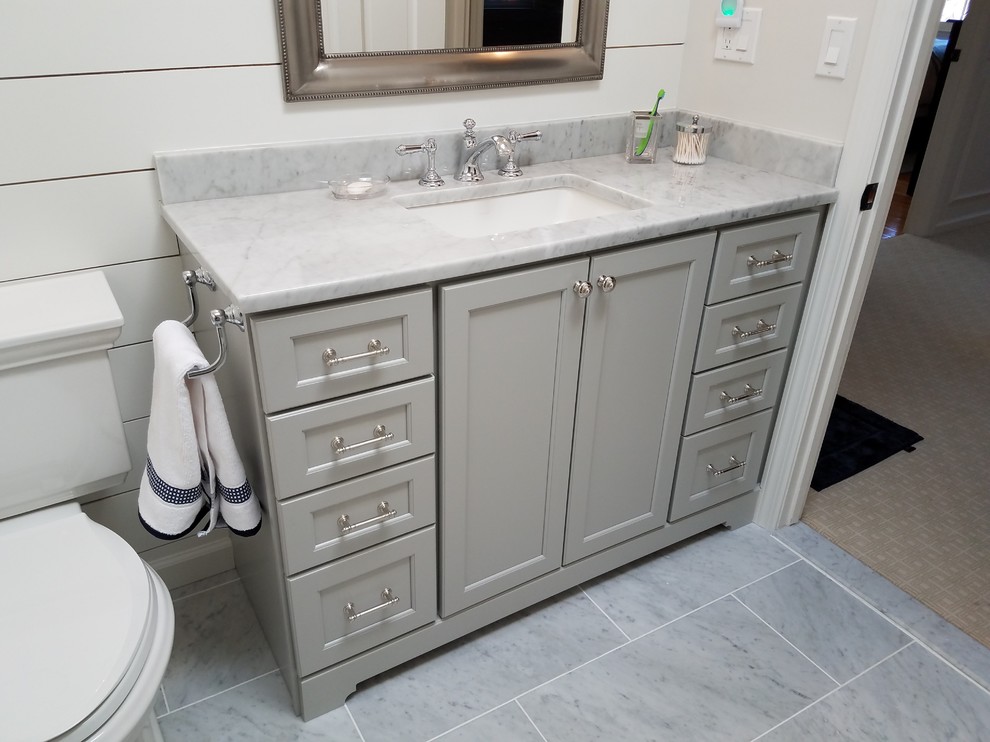 Design ideas for a medium sized traditional shower room bathroom in Bridgeport with recessed-panel cabinets, grey cabinets, an alcove shower, a one-piece toilet, white walls, marble flooring, a submerged sink, marble worktops, grey floors, a hinged door, grey tiles and metro tiles.