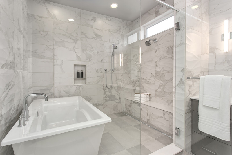 Inspiration for a large contemporary master white tile and porcelain tile porcelain tile bathroom remodel in Seattle with flat-panel cabinets, gray cabinets, gray walls, an undermount sink and quartz countertops