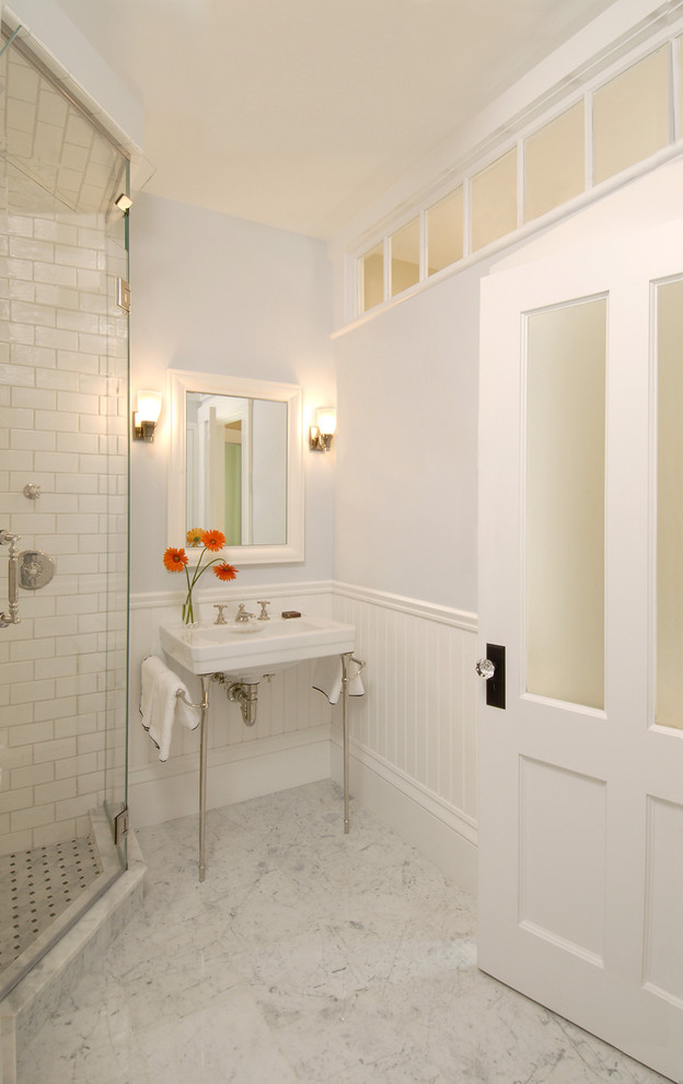 Photo of a traditional bathroom in Boston with a console sink and metro tiles.