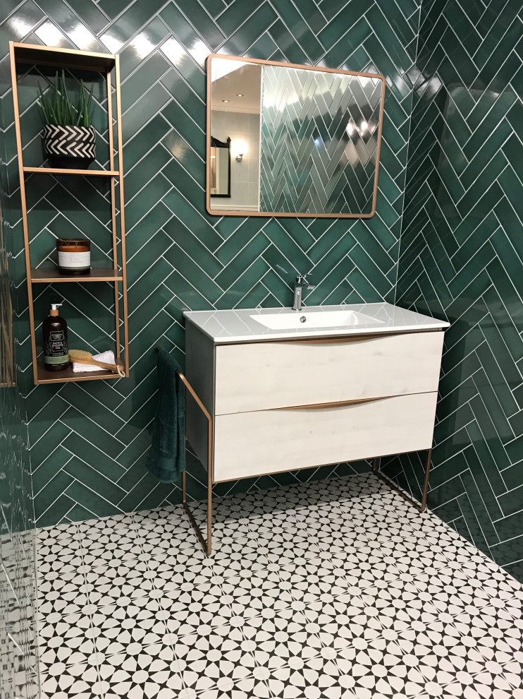 На фото: ванная комната в современном стиле с плоскими фасадами, зеленой плиткой, керамической плиткой, полом из керамической плитки, белой столешницей, тумбой под одну раковину и напольной тумбой