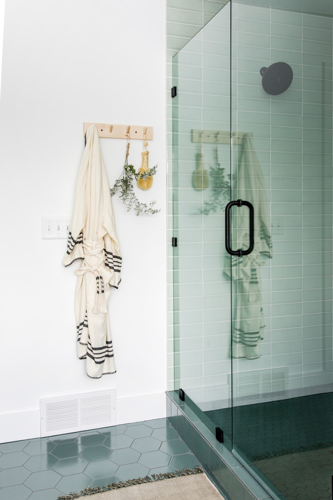 Inspiration for a large scandinavian master green tile and ceramic tile ceramic tile and green floor bathroom remodel in Grand Rapids with flat-panel cabinets, white cabinets, white walls, an undermount sink, quartzite countertops, a hinged shower door and white countertops