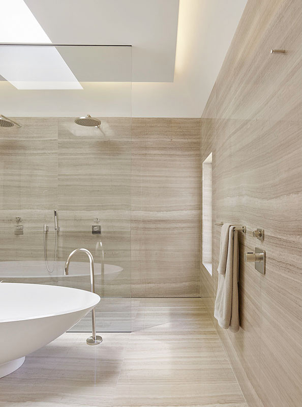 Example of a large minimalist master gray tile and stone slab marble floor bathroom design in San Francisco with an integrated sink, flat-panel cabinets, dark wood cabinets, quartz countertops, a wall-mount toilet and gray walls
