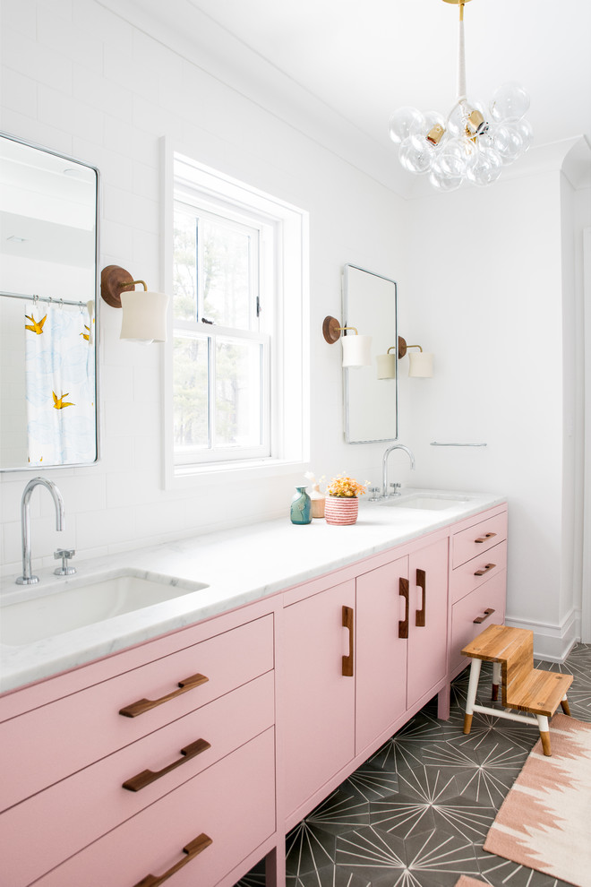 Design ideas for a farmhouse grey and pink ensuite bathroom in New York with flat-panel cabinets, purple cabinets, white walls, a submerged sink, grey floors and white worktops.