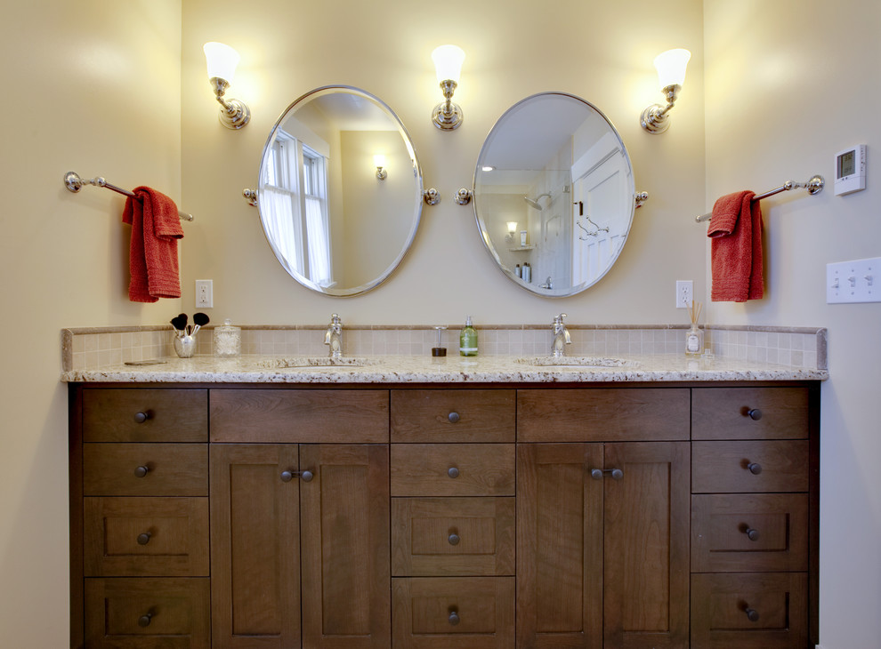 Example of an arts and crafts bathroom design in Seattle with granite countertops