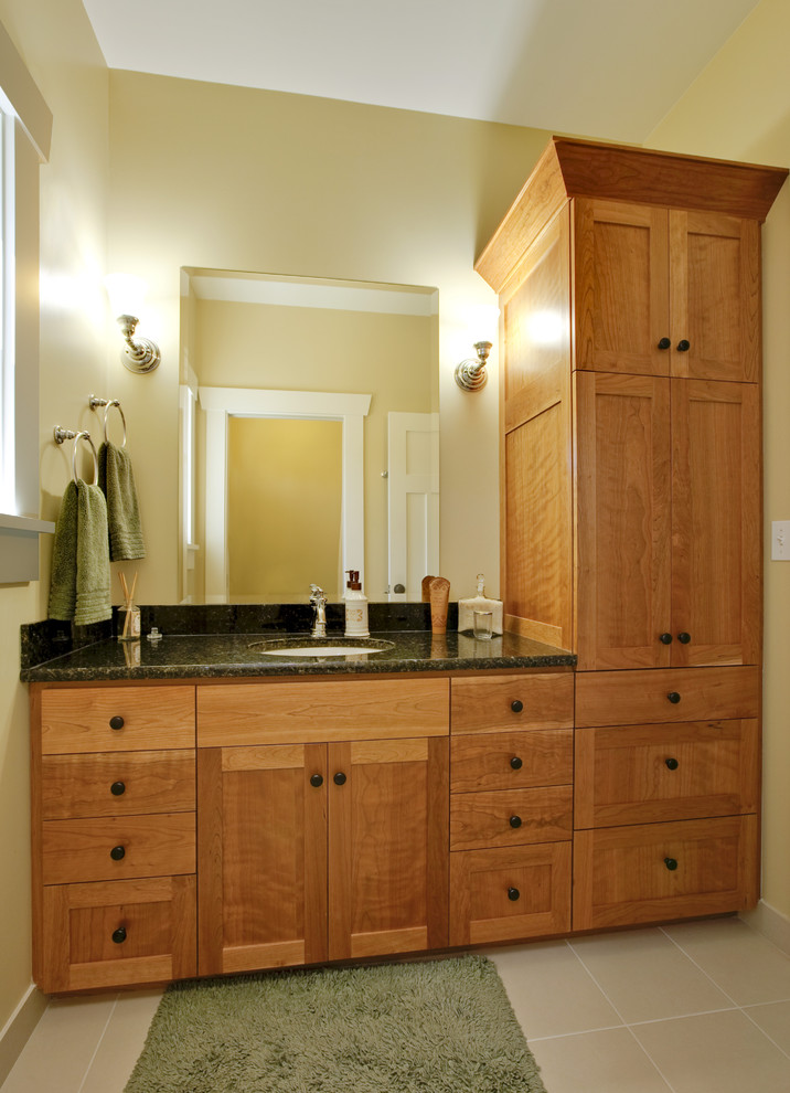 Design ideas for a classic bathroom in Seattle with a submerged sink, shaker cabinets and medium wood cabinets.