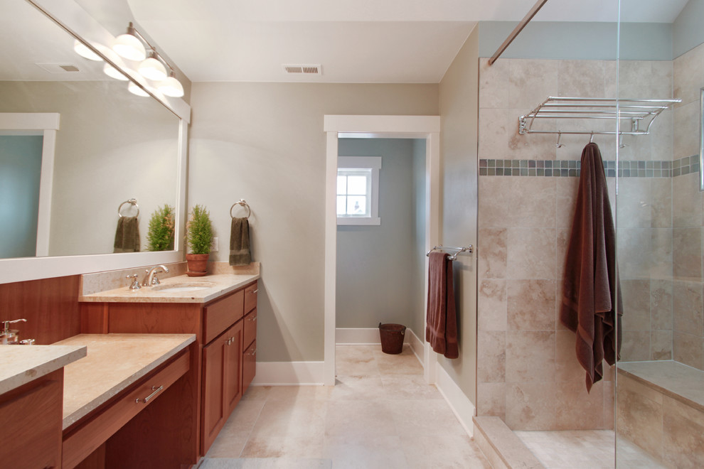 Inspiration for a mid-sized craftsman master beige tile and porcelain tile porcelain tile and beige floor bathroom remodel in Seattle with shaker cabinets, medium tone wood cabinets, gray walls, an undermount sink, quartzite countertops and beige countertops