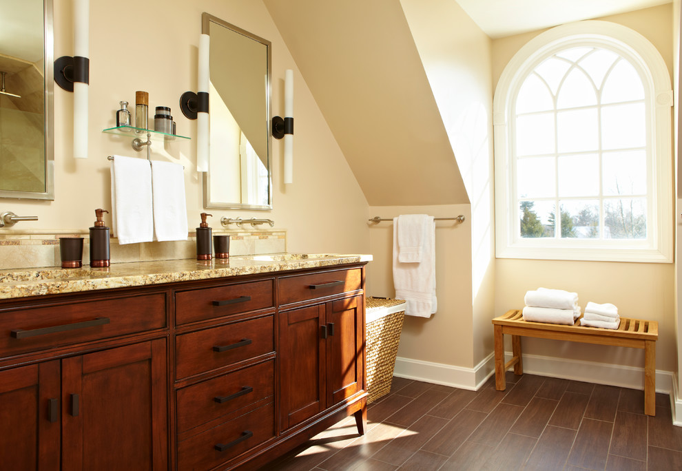 Traditional ensuite bathroom in Boston with medium wood cabinets, beige walls and shaker cabinets.
