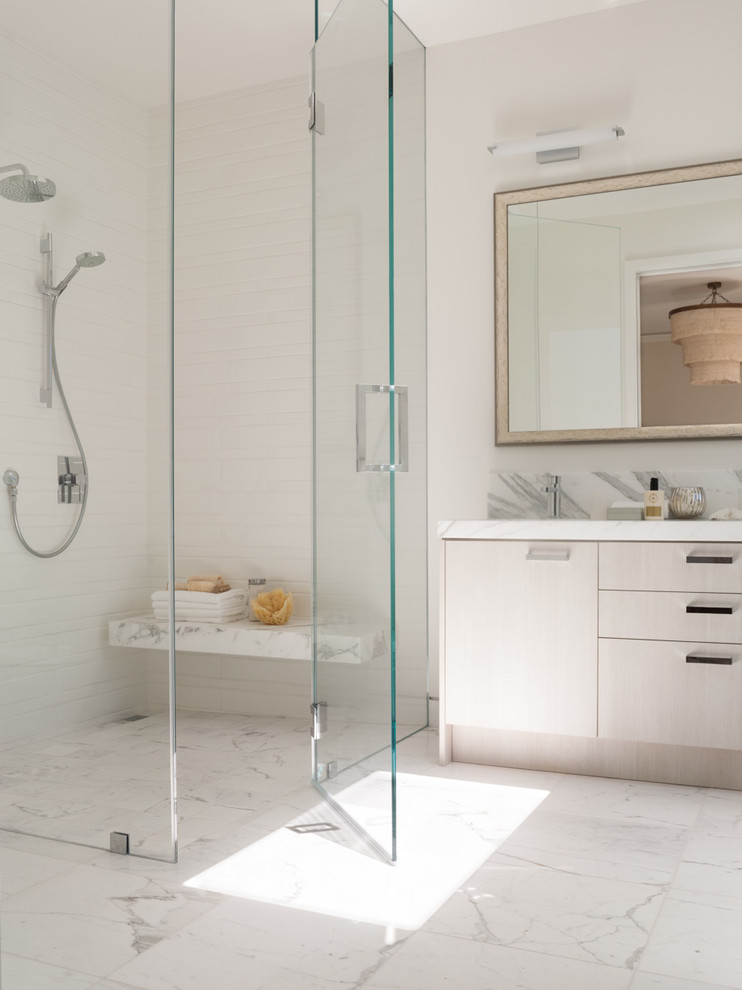 Trendy white tile bathroom photo in San Francisco with flat-panel cabinets