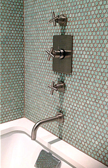 Photo of a medium sized contemporary ensuite bathroom in New York with a submerged sink, flat-panel cabinets, medium wood cabinets, wooden worktops, a built-in bath, a shower/bath combination, a one-piece toilet, blue tiles, mosaic tiles, blue walls and mosaic tile flooring.