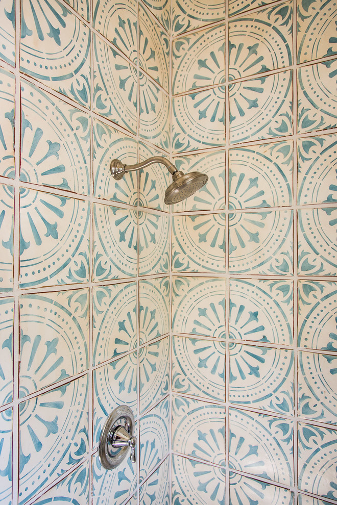 Doorless shower - mediterranean blue tile doorless shower idea in Los Angeles