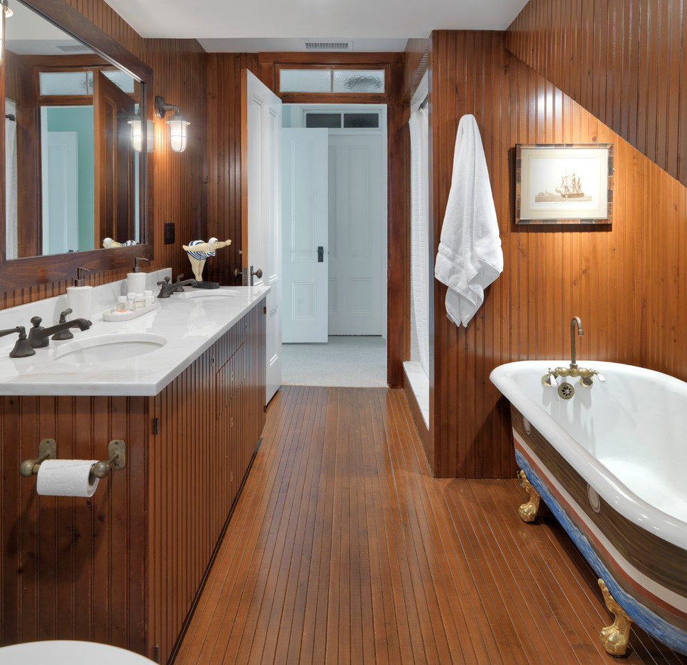 Photo of a contemporary bathroom in Boston with a claw-foot bath.