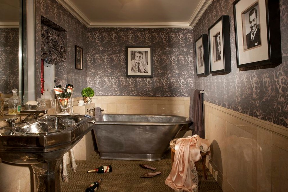 This is an example of a medium sized eclectic ensuite bathroom in Los Angeles with a freestanding bath, grey walls, porcelain flooring, a pedestal sink and beige floors.