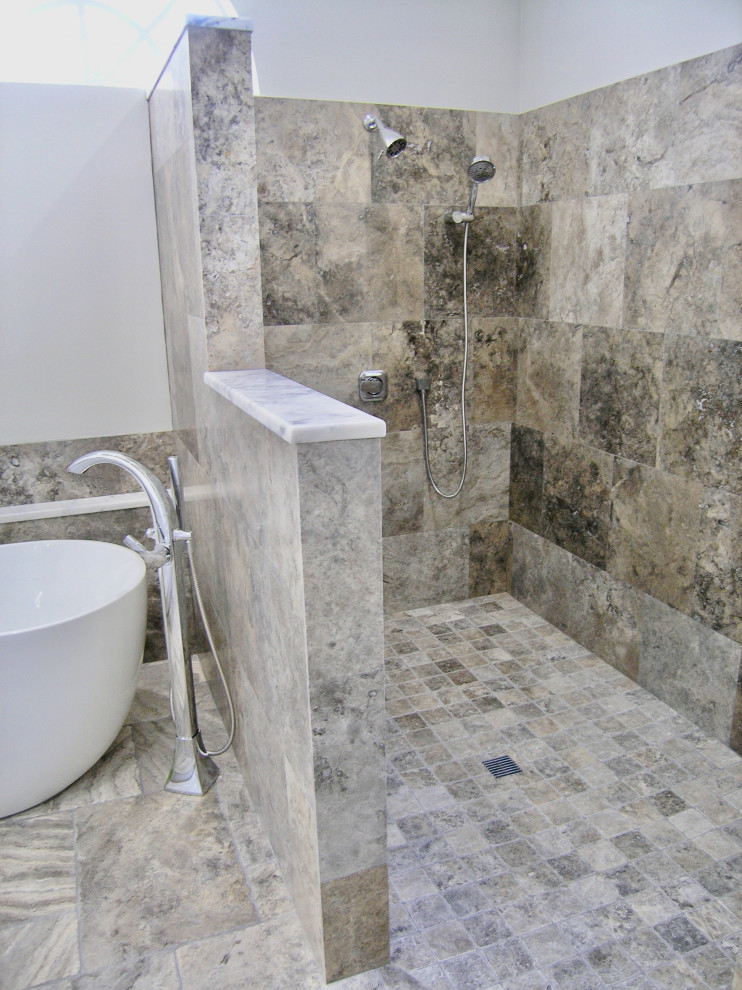 Bathroom - large traditional master gray tile and travertine tile travertine floor and gray floor bathroom idea in Tampa with shaker cabinets, white cabinets, a one-piece toilet, gray walls, an undermount sink, quartz countertops and gray countertops