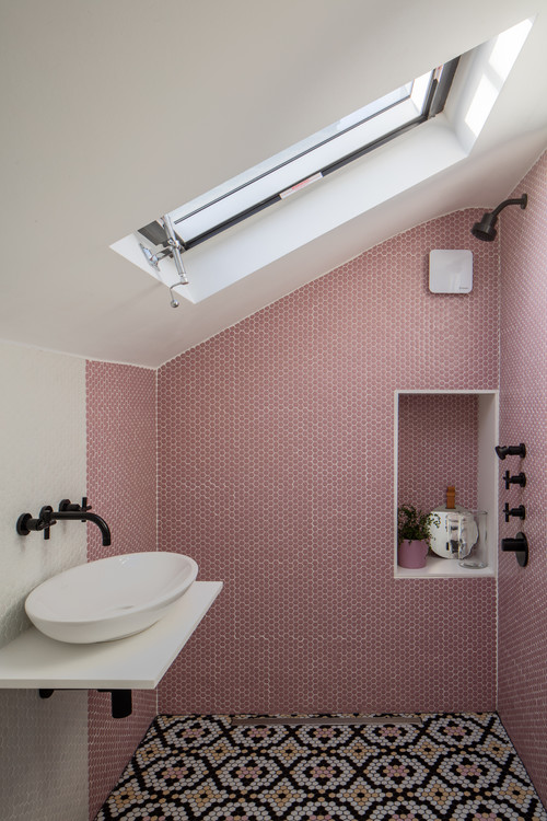 Pink Penny Tile Niche in Multicolored Mosaic Shower