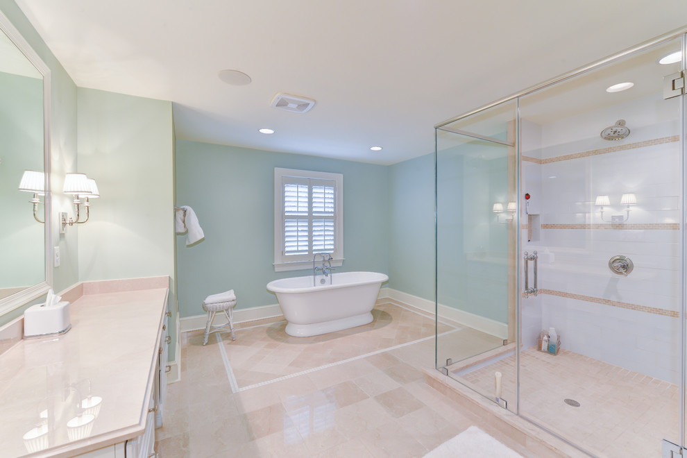 Mid-sized elegant master beige tile and ceramic tile ceramic tile bathroom photo with an integrated sink, beaded inset cabinets, white cabinets, granite countertops, a two-piece toilet and green walls