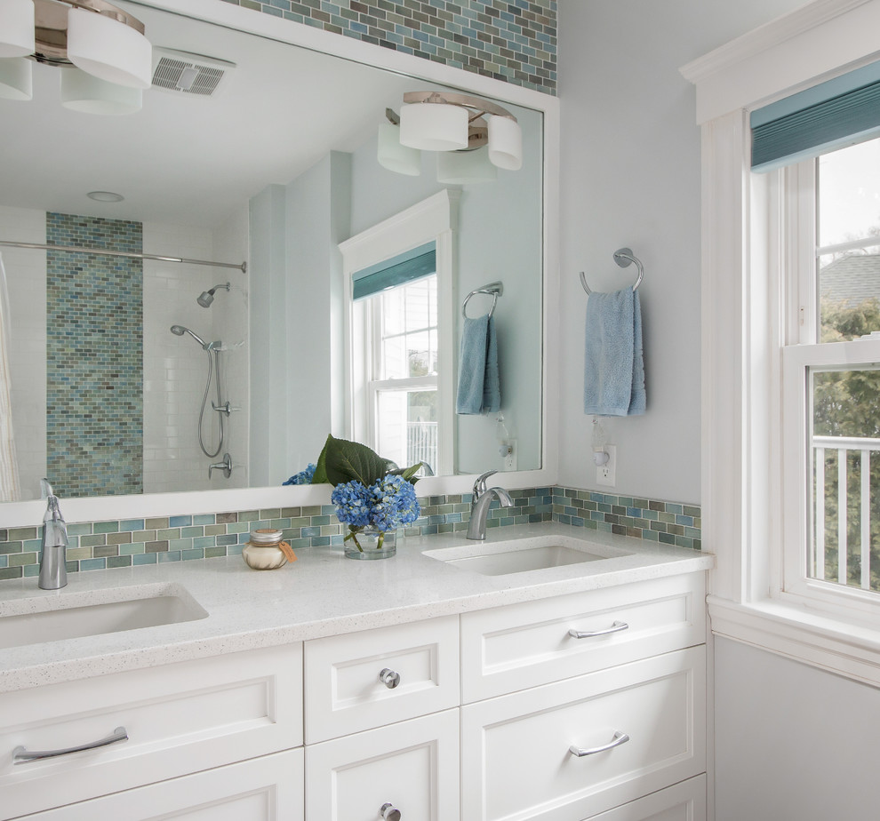 Example of a mid-sized classic 3/4 multicolored tile and mosaic tile bathroom design in Boston with recessed-panel cabinets, white cabinets, white walls, an undermount sink and quartzite countertops