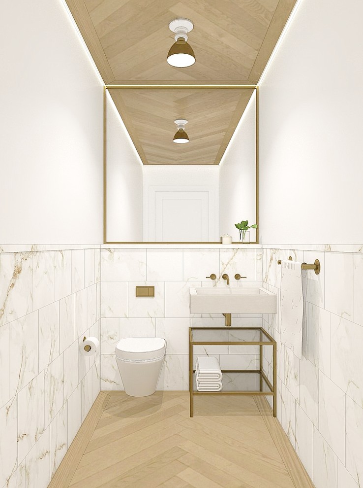 Idee per una piccola stanza da bagno design con ante lisce, pareti bianche, lavabo sottopiano, top in marmo, WC monopezzo, piastrelle multicolore, piastrelle in pietra e parquet chiaro