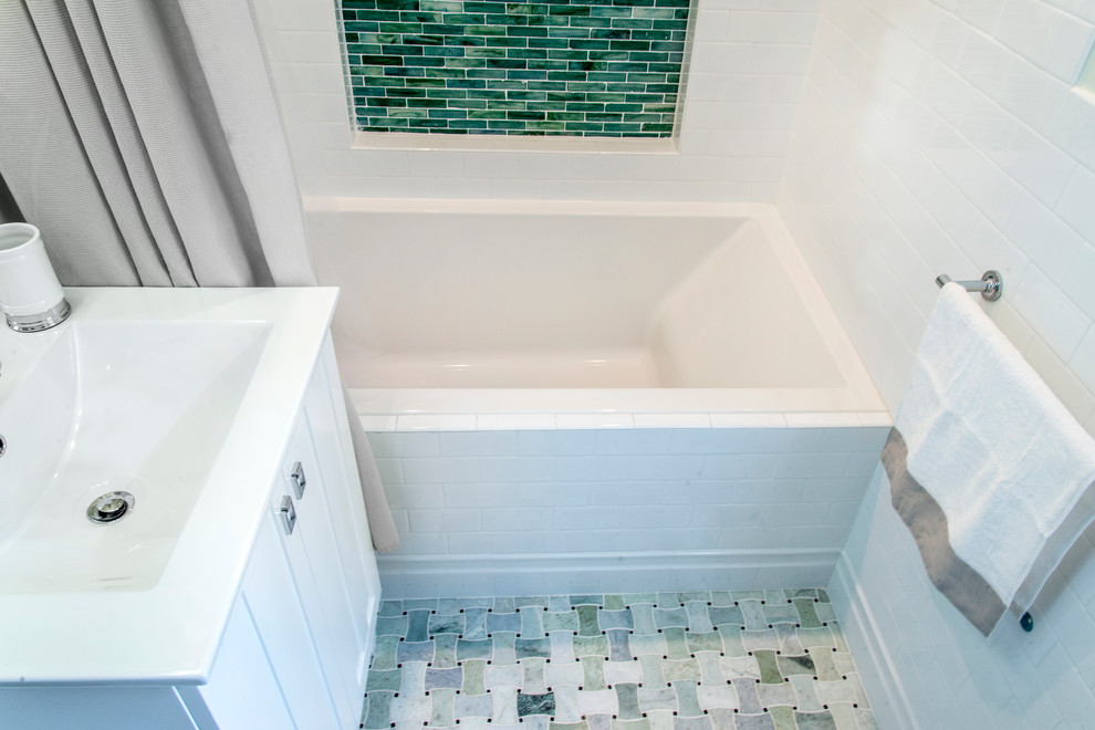 Inspiration for a small classic ensuite bathroom in DC Metro with white walls, mosaic tile flooring, an integrated sink, a submerged bath, an alcove shower, a one-piece toilet, white tiles, metro tiles, wooden worktops, recessed-panel cabinets and white cabinets.