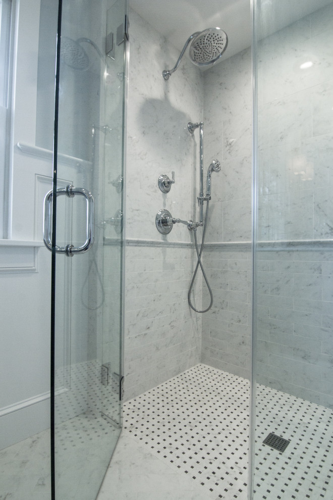 Large transitional kids' white tile and porcelain tile marble floor and white floor walk-in shower photo in Other with raised-panel cabinets, gray cabinets, a two-piece toilet, blue walls, an undermount sink, quartz countertops, a hinged shower door and white countertops