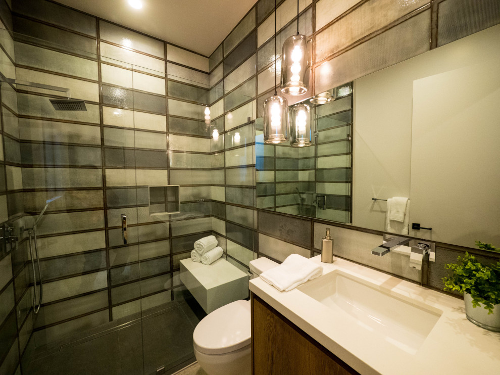 Inspiration for a large contemporary 3/4 stone slab porcelain tile and single-sink bathroom remodel in Los Angeles with flat-panel cabinets, dark wood cabinets, a one-piece toilet, an undermount sink, quartz countertops, a hinged shower door, white countertops and a floating vanity