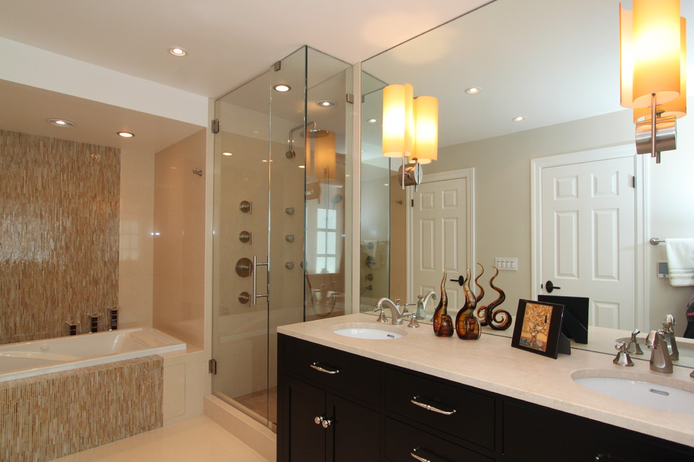 Идея дизайна: ванная комната: освещение в современном стиле с врезной раковиной, черными фасадами, накладной ванной, душем в нише, бежевой плиткой и удлиненной плиткой