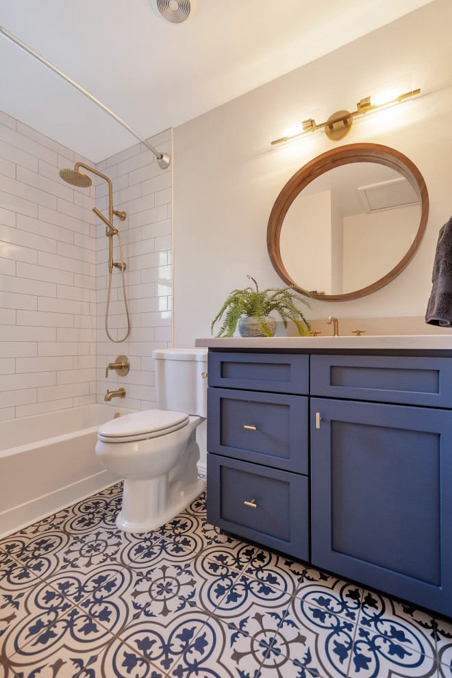 Bathroom - small transitional kids' white tile and subway tile porcelain tile, blue floor and single-sink bathroom idea in Phoenix with shaker cabinets, blue cabinets, gray walls, an undermount sink, quartz countertops, white countertops and a built-in vanity