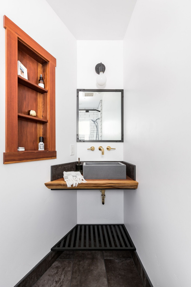 Bathroom - small coastal 3/4 ceramic tile, gray floor and single-sink bathroom idea in San Francisco with white walls, wood countertops, a vessel sink and brown countertops