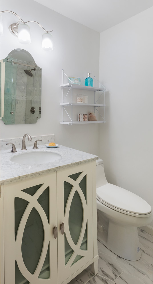 Bathroom - small transitional 3/4 white tile and marble tile porcelain tile and white floor bathroom idea in Seattle with furniture-like cabinets, white cabinets, a one-piece toilet, white walls, an integrated sink, quartzite countertops and gray countertops