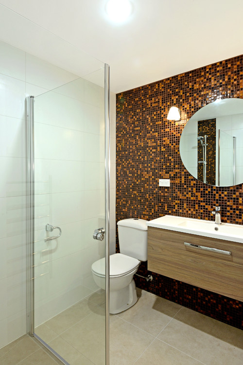 Industrial Chic: Yellow Cabinets and Black Glass Mosaic Backsplash