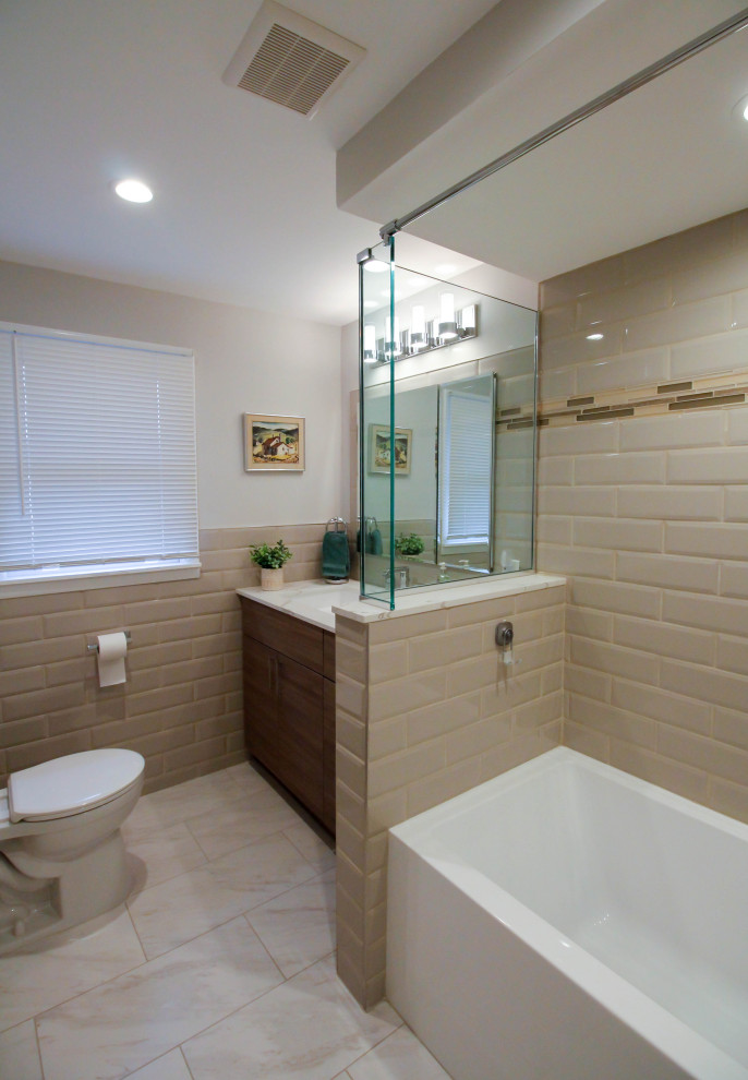 Example of a mid-sized trendy kids' beige tile and porcelain tile porcelain tile, white floor and single-sink bathroom design in New York with flat-panel cabinets, brown cabinets, a two-piece toilet, beige walls, a trough sink, quartz countertops, white countertops and a built-in vanity