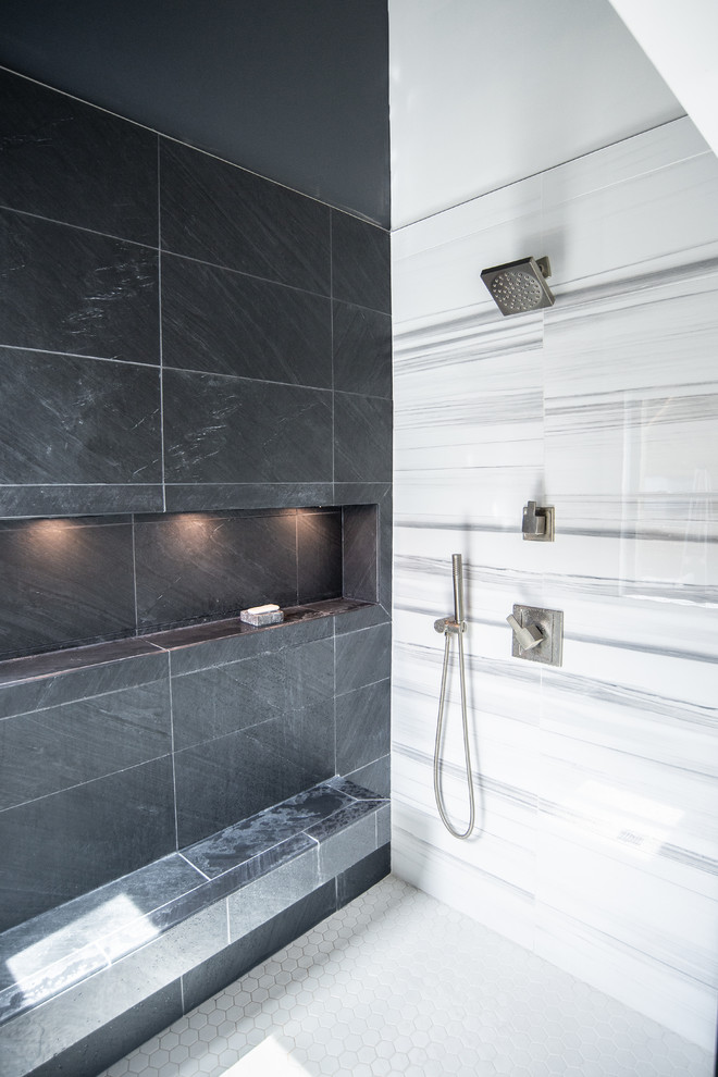 Photo of a large contemporary ensuite bathroom in New York with flat-panel cabinets, white cabinets, a walk-in shower, a one-piece toilet, black and white tiles, multi-coloured walls, ceramic flooring, a submerged sink, engineered stone worktops, white floors, an open shower and white worktops.