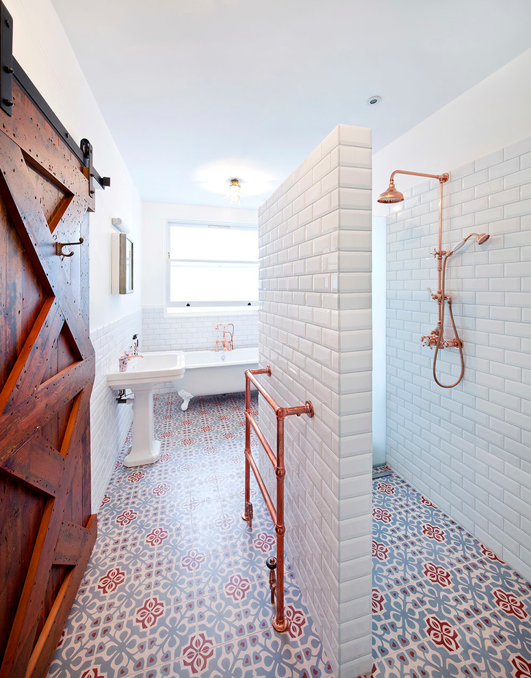 Bathroom - contemporary multicolored floor bathroom idea in London with a pedestal sink