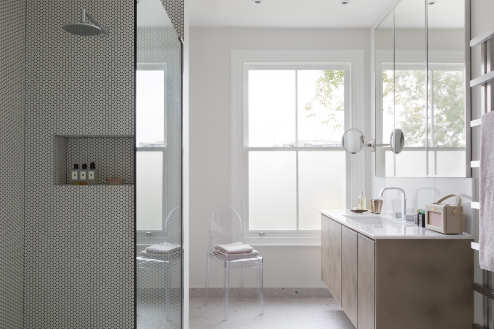 Photo of a large contemporary ensuite wet room bathroom in London with flat-panel cabinets, beige cabinets, white tiles, ceramic flooring, quartz worktops, an open shower, white worktops, glass tiles, white walls, a submerged sink and grey floors.