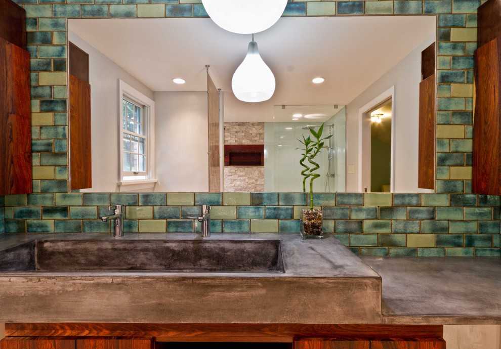 Inspiration for a large 1960s 3/4 green tile and cement tile porcelain tile and beige floor bathroom remodel in Other with flat-panel cabinets, dark wood cabinets, a two-piece toilet, beige walls, a trough sink and concrete countertops