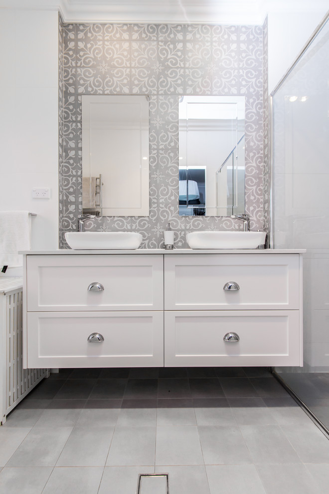 Example of a transitional bathroom design in Sydney