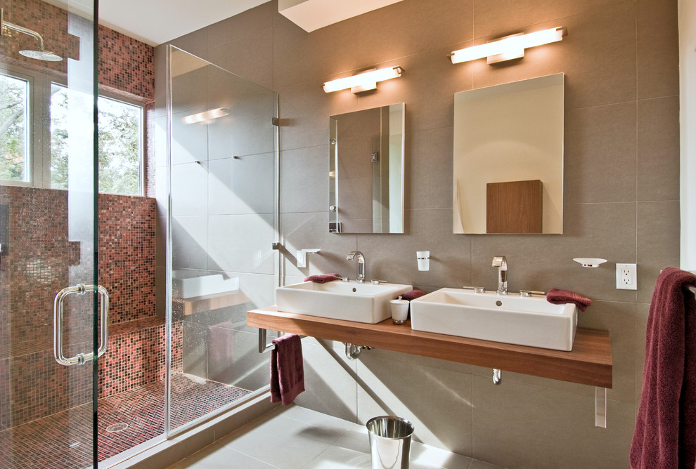 Ejemplo de cuarto de baño moderno con lavabo sobreencimera
