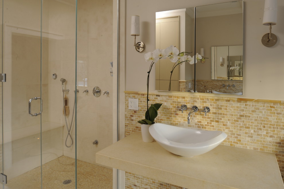 Photo of a large contemporary bathroom in New York with a vessel sink, limestone worktops and a double shower.