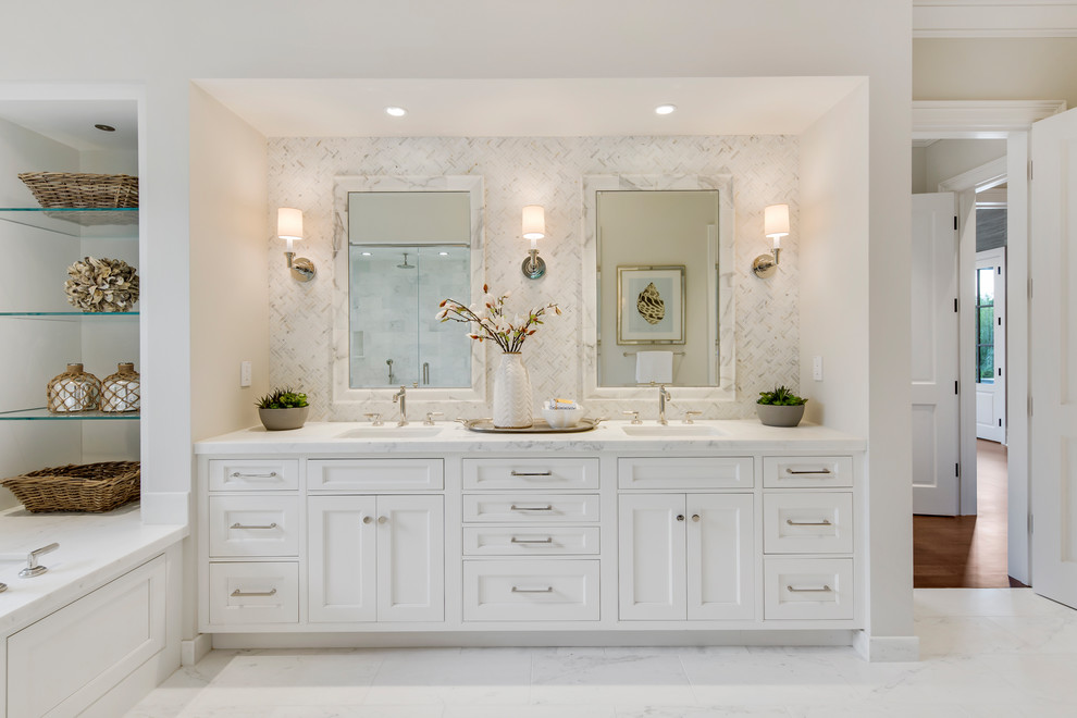 Large transitional master white tile and marble tile marble floor and white floor alcove shower photo in San Francisco with shaker cabinets, white cabinets, marble countertops, white countertops, an undermount tub, gray walls, an undermount sink and a hinged shower door