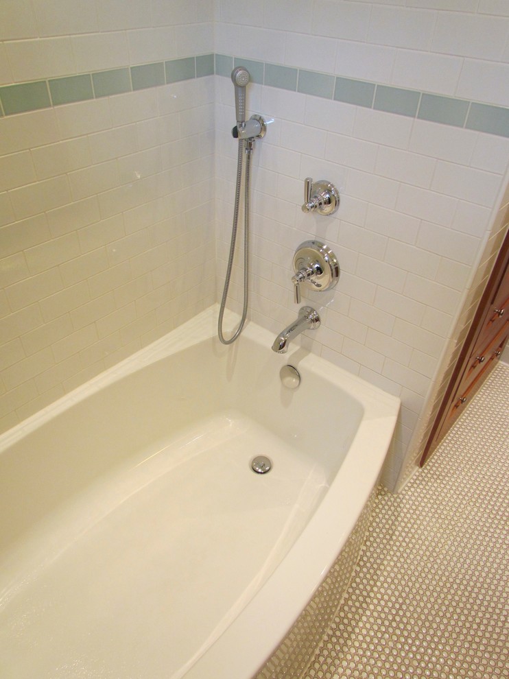 Example of a mid-sized classic 3/4 white tile and ceramic tile ceramic tile bathroom design in Chicago with an undermount sink, shaker cabinets, medium tone wood cabinets and granite countertops
