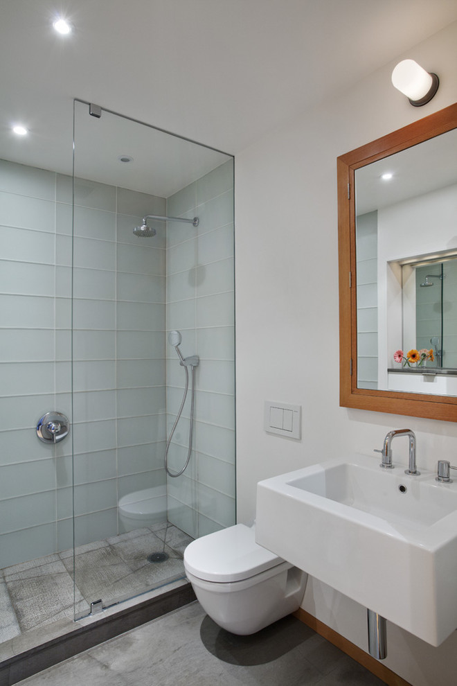 Trendy glass tile bathroom photo in New York with a wall-mount sink