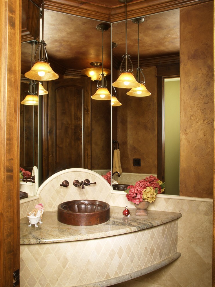 Example of a mid-sized classic 3/4 stone tile and beige tile bathroom design in Denver with granite countertops, medium tone wood cabinets, brown walls and a vessel sink