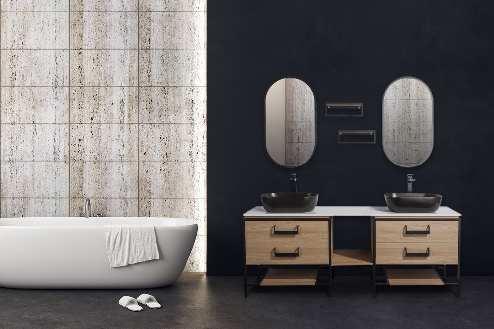 Esempio di una stanza da bagno industriale con ante lisce, ante in legno chiaro, lavabo a bacinella, top in superficie solida e top bianco
