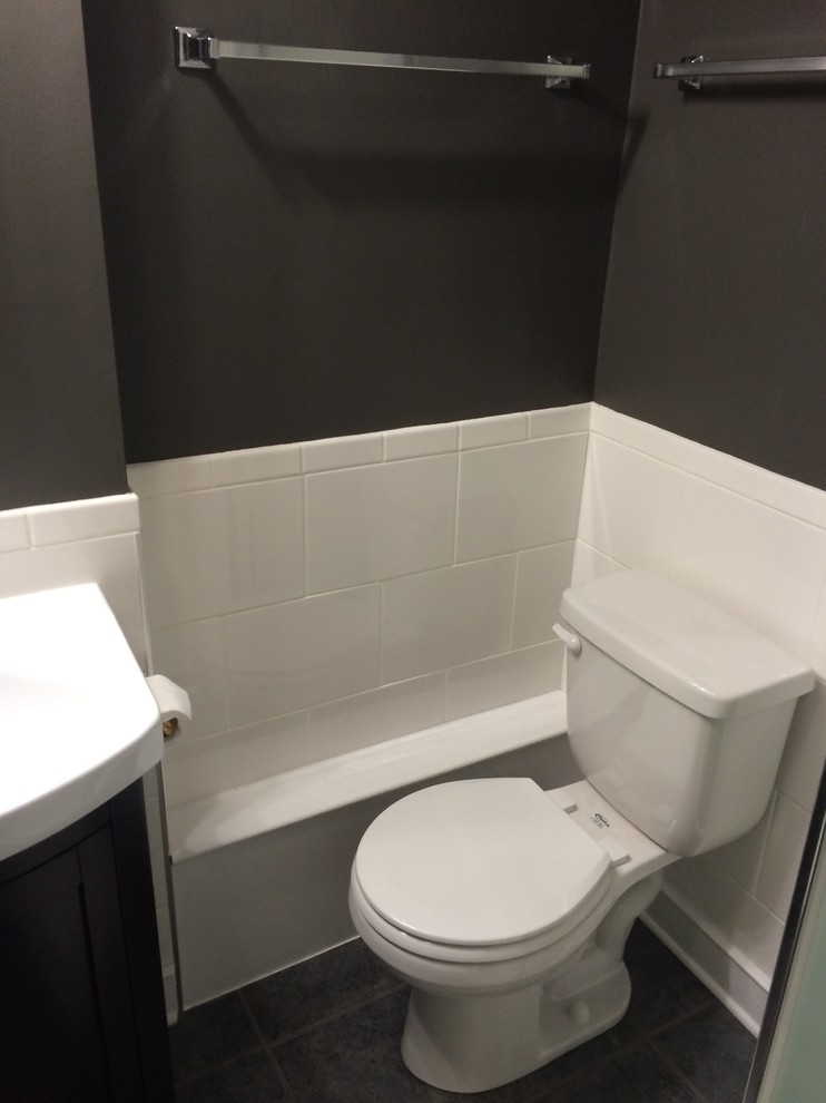 Example of a small classic 3/4 ceramic tile bathroom design in Other with a two-piece toilet, gray walls and an undermount sink