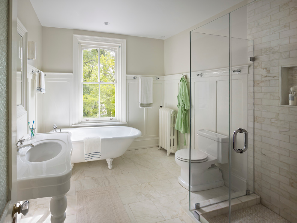 Example of a classic claw-foot bathtub design in Philadelphia with a console sink