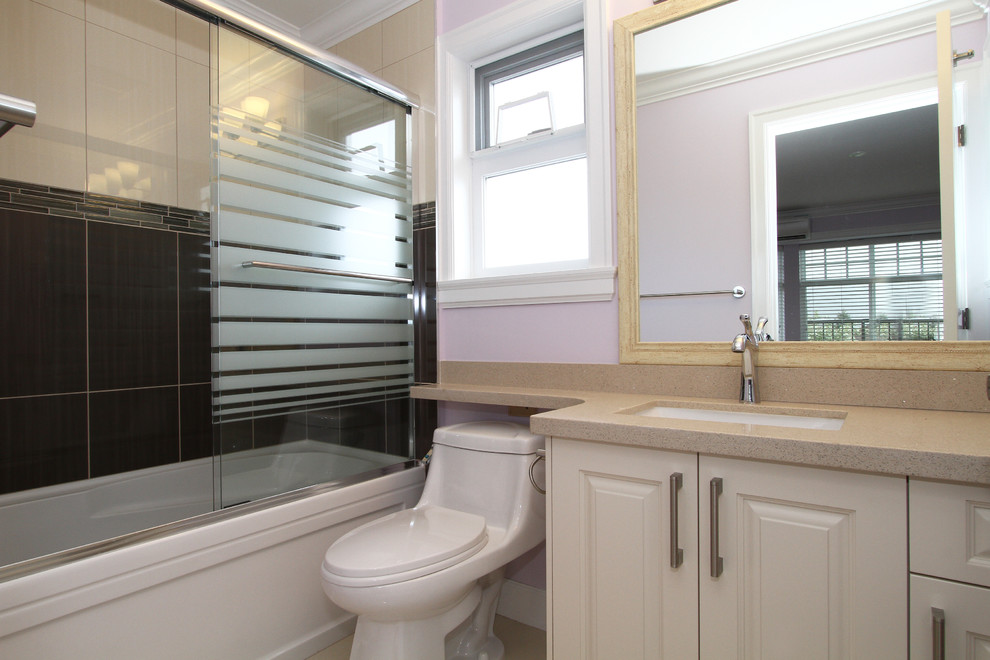 Design ideas for a classic bathroom in Vancouver with a submerged sink, raised-panel cabinets, beige cabinets, granite worktops, an alcove bath, a shower/bath combination, a one-piece toilet, beige tiles and ceramic tiles.
