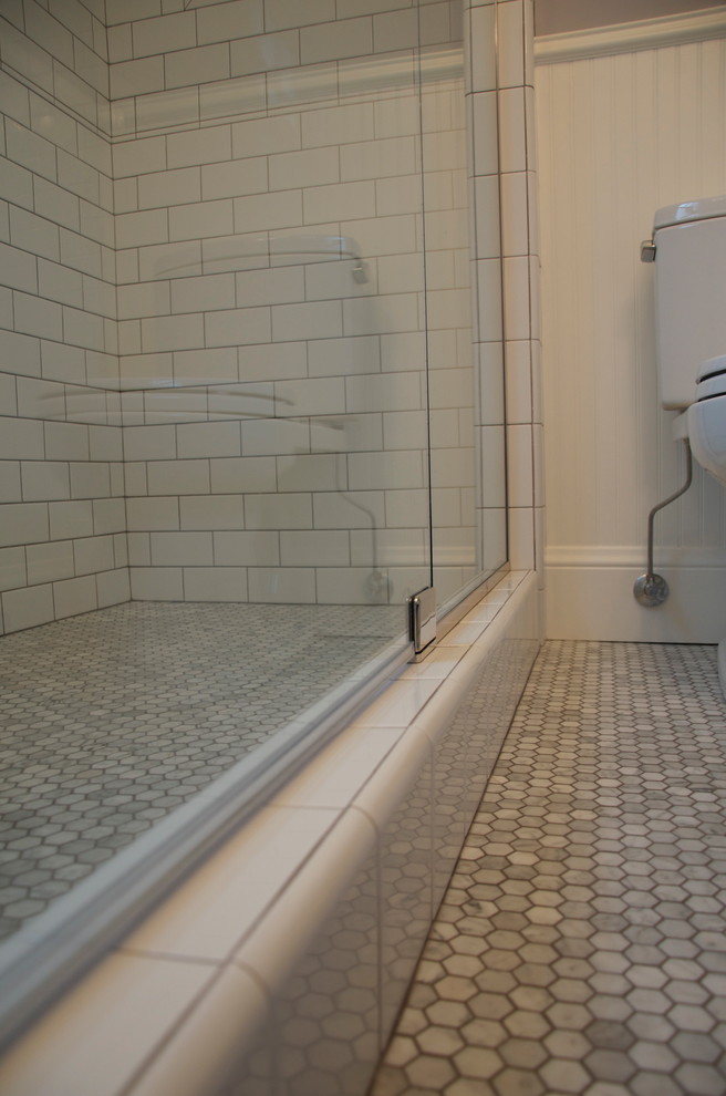 Mid-sized elegant 3/4 white tile and subway tile mosaic tile floor and gray floor alcove shower photo in Portland with white walls, a pedestal sink and a hinged shower door
