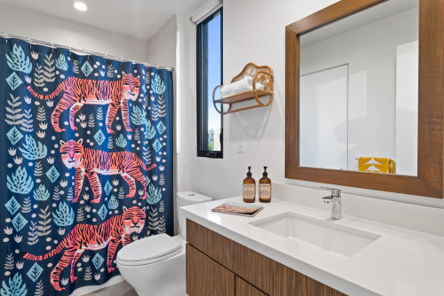Jungle Retreat: Colorful Tiger Print Shower Curtain with Wood Vanity